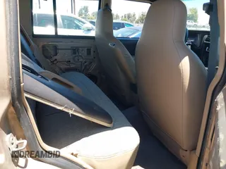 1999 Jeep Cherokee SE with VIN 1J4FF28S4XL592788, listed as a IAAI auction lot 42560002 with 189,258 mi miles and . Bid and sale history available at DreamBid. Image 8.