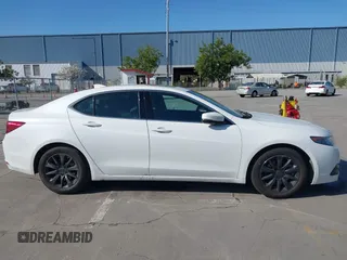 2015 Acura TLX with VIN 19UUB1F34FA019769, listed as a IAAI auction lot 41909731 with 93,254 mi miles. Bid and sale history available at carsss.com. Image 13.