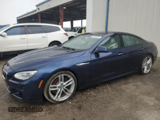 2015 BMW 6 Series 640i with VIN WBA6A0C59FGB53667, listed as a Copart auction lot 74034834 with Not Provided miles and Salvage Title. Bid and sale history available at DreamBid. Image 1.