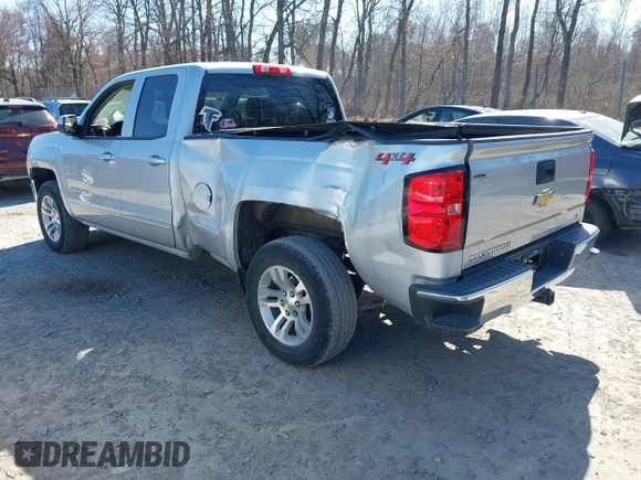 2018 Chevrolet Silverado 1500 LT with VIN 1GCVKREH4JZ323242, listed as a IAAI auction lot 41971945 with 63,915 mi miles and . Bid and sale history available at DreamBid. Image 3.