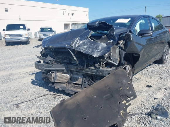 2020 Ford Fusion Titanium with VIN 3FA6P0K91LR175109, listed as a IAAI auction lot 42267532 with 75,000 mi miles and . Bid and sale history available at DreamBid. Image 6.