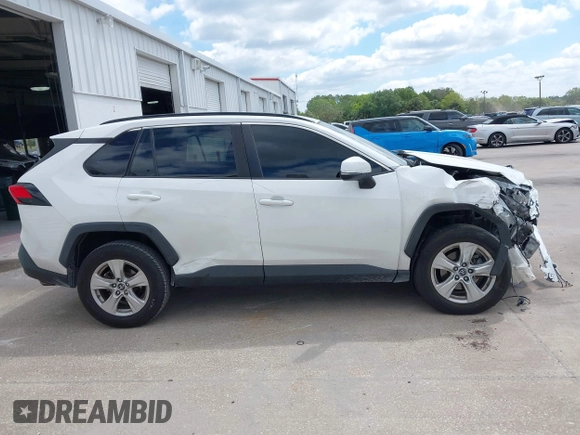 2019 Toyota RAV4 XLE with VIN 2T3W1RFVXKW033696, listed as a IAAI auction lot 42044151 with 126,872 mi miles and . Bid and sale history available at DreamBid. Image 14.