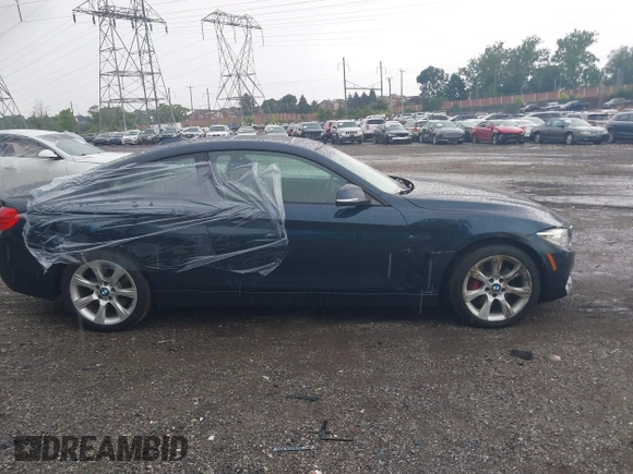 2014 BMW 4 Series 435i xDrive with VIN WBA3R5C58EK188668, listed as a IAAI auction lot 39946954 with 89,513 mi miles and . Bid and sale history available at DreamBid. Image 14.