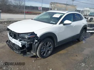 2024 Mazda CX-30 S Premium with VIN 3MVDMBDM5RM630460, listed as a IAAI auction lot 41135965 with 5,544 mi miles and . Bid and sale history available at DreamBid. Image 2.