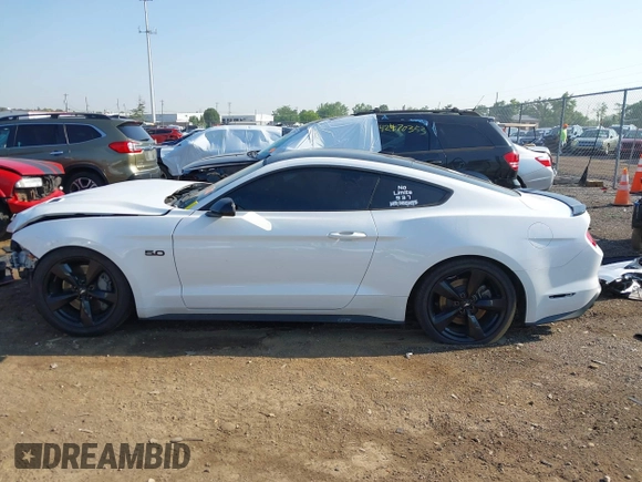 2023 Ford Mustang GT with VIN 1FA6P8CF6P5304456, listed as a IAAI auction lot 42407246 with 59,538 mi miles and . Bid and sale history available at DreamBid. Image 15.