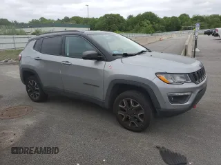 2021 Jeep Compass Trailhawk z VIN 3C4NJDDBXMT565063, wystawiony jako Copart lot #57620595 z przebiegiem 125 956 mil mil oraz Czysty tytuł • Clean title. Historia ofert i sprzedaży dostępna na DreamBid. Obrazek 4.
