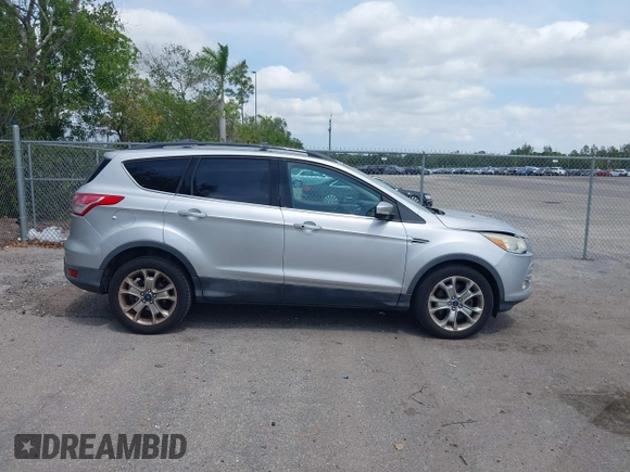 2013 Ford Escape SEL with VIN 1FMCU0H97DUD95194, listed as a IAAI auction lot 42052786 with 145,616 mi miles. Bid and sale history available at carsss.com. Image 13.