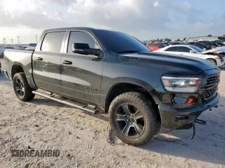 2023 Ram 1500 Big Horn with VIN 1C6SRFFT2PN666039, listed as a Copart auction lot 61458085 with 29,206 mi miles and Salvage title. Bid and sale history available at DreamBid. Image 4.