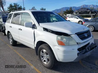 2005 Honda Pilot EX with VIN 5FNYF18475B060655, listed as a IAAI auction lot 41381619 with 142,680 mi miles and . Bid and sale history available at DreamBid. Image 1.