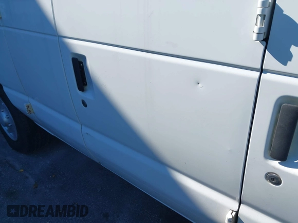 2013 Ford Econoline Cargo Commercial with VIN 1FTNE2EL2DDA97948, listed as a IAAI auction lot 41616701 with 199,739 mi miles and . Bid and sale history available at DreamBid. Image 17.