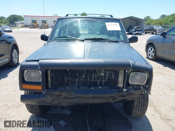 2000 Jeep Cherokee SE with VIN 1J4FF28S0YL236369, listed as a IAAI auction lot 42314386 with 159,005 mi miles and . Bid and sale history available at DreamBid. Image 12.