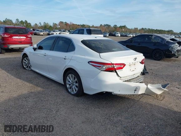 2019 Toyota Camry LE with VIN 4T1B11HK7KU806197, listed as a IAAI auction lot 41721148 with 83,373 mi miles and . Bid and sale history available at DreamBid. Image 3.