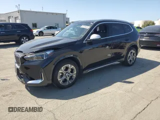 2024 BMW X1 xDrive28i with VIN WBX73EF09R5Z39211, listed as a Copart auction lot 52126935 with 4,581 mi miles and Salvage Title. Bid and sale history available at carsss.com. Image 1.