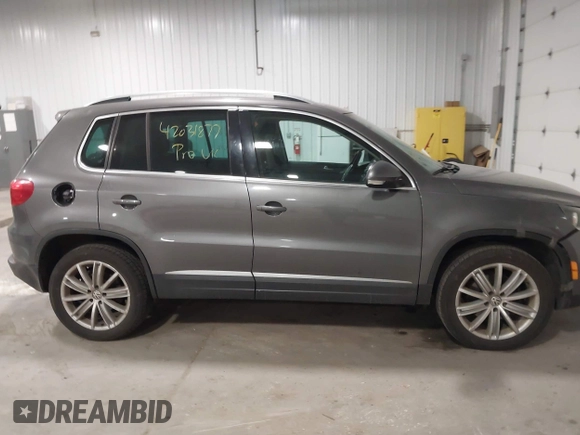 2012 Volkswagen Tiguan S with VIN WVGBV7AX2CW002991, listed as a IAAI auction lot 42031877 with 205,979 mi miles and . Bid and sale history available at DreamBid. Image 13.