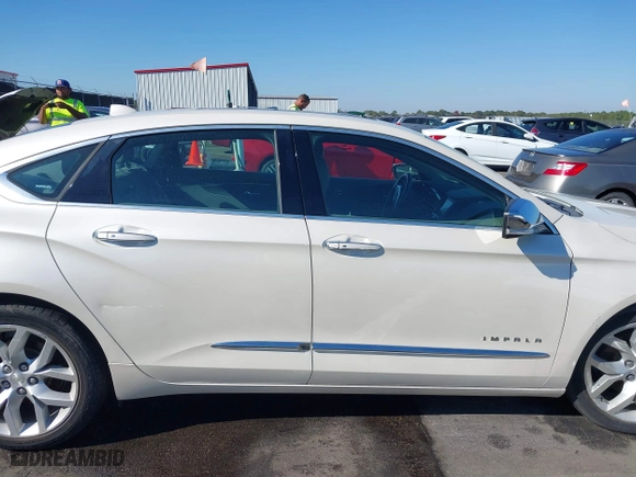 2014 Chevrolet Impala LTZ with VIN 2G1155S32E9206212, listed as a IAAI auction lot 40686005 with 76,750 mi miles. Bid and sale history available at carsss.com. Image 13.