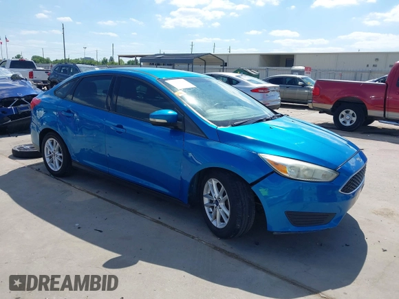 2015 Ford Focus SE with VIN 1FADP3F21FL379837, listed as a IAAI auction lot 42021623 with 146,571 mi miles. Bid and sale history available at carsss.com. Image 1.