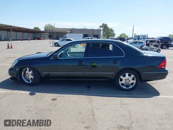 2001 Lexus LS 430 z VIN JTHBN30F810045610, wystawiony jako IAAI lot #42004279 z przebiegiem 143 497 mil mil oraz . Historia ofert i sprzedaży dostępna na DreamBid. Obrazek 13.
