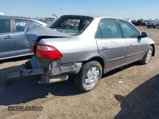 2000 Honda Accord LX z VIN 1HGCG1645YA021815, wystawiony jako IAAI lot #42438876 z przebiegiem 219 687 mil mil oraz . Historia ofert i sprzedaży dostępna na DreamBid. Obrazek 4.