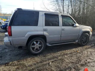 2000 GMC Denali z VIN 1GKEK13R9YR105616, wystawiony jako Copart lot #84221164 z przebiegiem 201 378 mil mil oraz Tytuł czysty. Historia ofert i sprzedaży dostępna na DreamBid. Obrazek 3.