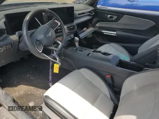 2024 Ford Mustang EcoBoost with VIN 1FA6P8TH7R5105582, listed as a Copart auction lot 62983705 with 14,984 mi miles and Salvage title. Bid and sale history available at DreamBid. Image 7.