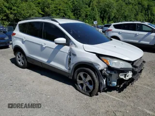 2013 Ford Escape SE z VIN 1FMCU9G99DUC73121, wystawiony jako Copart lot #57966605 z przebiegiem 169 764 mil mil oraz Szkoda całkowita • Salvage title. Historia ofert i sprzedaży dostępna na DreamBid. Obrazek 4.