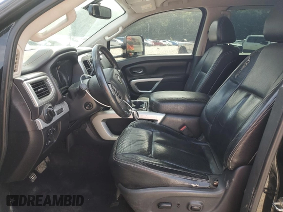 2016 Nissan Titan Platinum Reserve with VIN 1N6BA1F40GN512437, listed as a Copart auction lot 63521325 with 203,879 mi miles and Clean title. Bid and sale history available at DreamBid. Image 7.