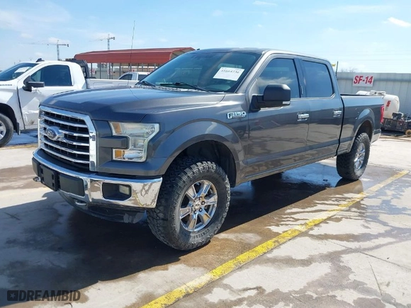 2015 Ford F-150 XLT w/HD Payload Pkg with VIN 1FTFW1EF7FKD04869, listed as a IAAI auction lot 41664736 with 165,784 mi miles. Bid and sale history available at carsss.com. Image 2.