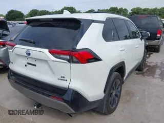 2022 Toyota RAV4 Hybrid SE with VIN 4T3T6RFV4NU065150, listed as a IAAI auction lot 42166772 with 69,868 mi miles and . Bid and sale history available at DreamBid. Image 4.