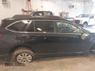 2019 Subaru Outback Premium with VIN 4S4BSAFC4K3217719, listed as a IAAI auction lot 42252640 with 210,467 mi miles and . Bid and sale history available at DreamBid. Image 13.