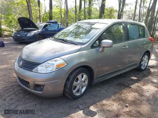 2010 Nissan Versa 1.8 SL with VIN 3N1BC1CP5AL357518, listed as a IAAI auction lot 42090152 with 149,821 mi miles. Bid and sale history available at carsss.com. Image 2.