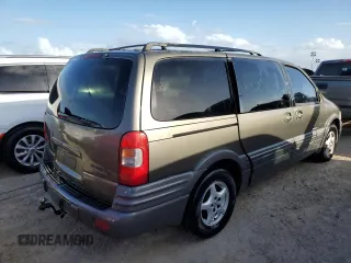 1998 Pontiac Montana z VIN 1GMDX03EXWD344453, wystawiony jako Copart lot #77226424 z przebiegiem Nie podano mil oraz Szkoda całkowita • Salvage title. Historia ofert i sprzedaży dostępna na DreamBid. Obrazek 3.