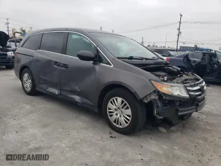 2015 Honda Odyssey LX with VIN 5FNRL5H29FB009680, listed as a Copart auction lot 54065515 with 109,446 mi miles and Salvage Title. Bid and sale history available at carsss.com. Image 4.