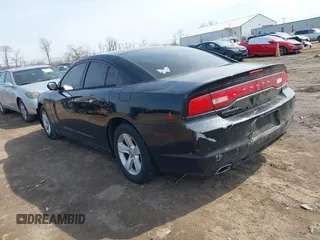2014 Dodge Charger SE with VIN 2C3CDXBG4EH268898, listed as a IAAI auction lot 41790753 with 318,732 mi miles and . Bid and sale history available at DreamBid. Image 3.