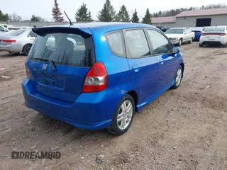 2007 Honda Fit Sport with VIN JHMGD38617S049394, listed as a IAAI auction lot 41962672 with 117,368 mi miles. Bid and sale history available at carsss.com. Image 4.