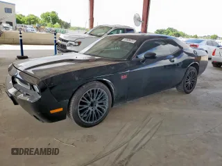 2012 Dodge Challenger R/T Plus z VIN 2C3CDYBT1CH189379, wystawiony jako Copart lot #59757645 z przebiegiem 195 048 mil mil oraz Czysty tytuł • Clean title. Historia ofert i sprzedaży dostępna na DreamBid. Obrazek 1.