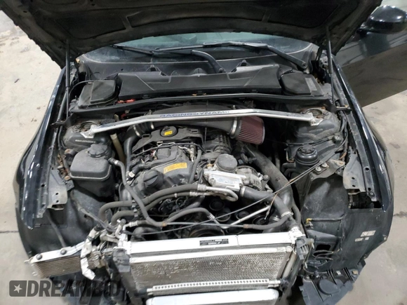 2011 BMW 3 Series 335i xDrive with VIN WBAPL5C57BA983005, listed as a Copart auction lot 48710385 with 85,344 mi miles and Salvage title. Bid and sale history available at DreamBid. Image 12.