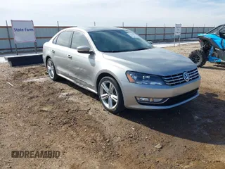 2014 Volkswagen Passat TDI SEL Premium with VIN 1VWCN7A33EC013425, listed as a IAAI auction lot 41381958 with 104,692 mi miles. Bid and sale history available at carsss.com. Image 1.