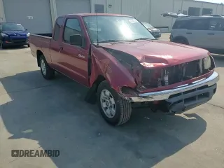 2000 Nissan Frontier XE with VIN 1N6DD26SXYC393054, listed as a Copart auction lot 62410125 with 106,319 mi miles and Salvage title. Bid and sale history available at DreamBid. Image 14.