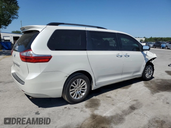 2015 Toyota Sienna XLE with VIN 5TDYK3DC1FS612491, listed as a Copart auction lot 53673815 with 169,306 mi miles and Salvage Title. Bid and sale history available at DreamBid. Image 3.