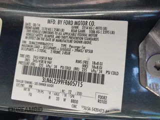 2015 Lincoln MKZ z VIN 3LN6L2J99FR605715, wystawiony jako IAAI lot #41431384 z przebiegiem Nie podano mil oraz . Historia ofert i sprzedaży dostępna na DreamBid. Obrazek 9.