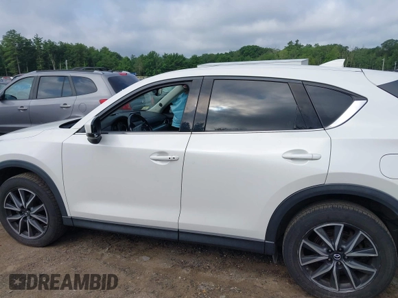 2018 Mazda CX-5 Grand Touring with VIN JM3KFBDM0J0308813, listed as a IAAI auction lot 42657978 with 78,119 mi miles and . Bid and sale history available at DreamBid. Image 15.