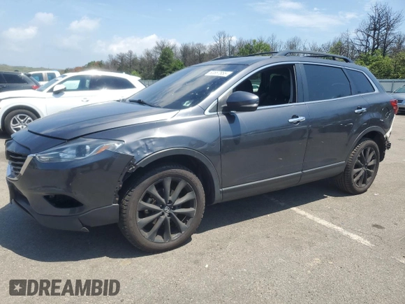 2014 Mazda CX-9 Grand Touring with VIN JM3TB3DV9E0444720, listed as a Copart auction lot 63687855 with 144,568 mi miles and Salvage title. Bid and sale history available at DreamBid. Image 1.