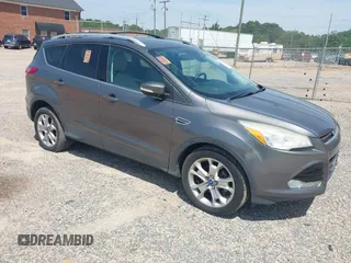 2014 Ford Escape Titanium z VIN 1FMCU0JX3EUA26519, wystawiony jako IAAI lot #42553081 z przebiegiem 108 052 mil mil oraz . Historia ofert i sprzedaży dostępna na DreamBid. Obrazek 1.