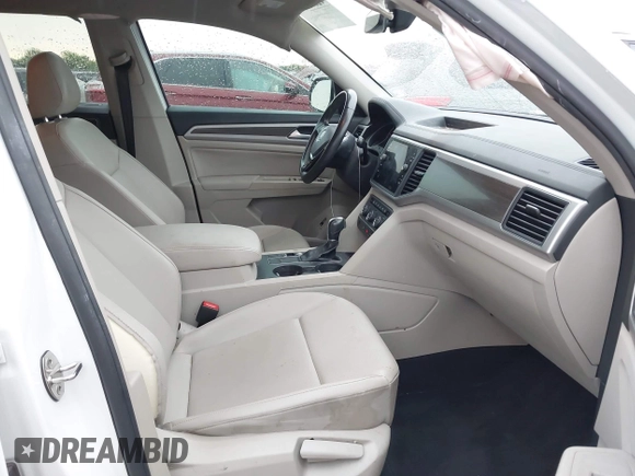 2018 Volkswagen Atlas SE с VIN 1V2DR2CA1JC587959, выставлен на аукционе IAAI как лот 42190292 с пробегом 93 832 миль миль и . История ставок и продаж доступна на DreamBid. Изображение 5.