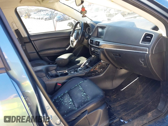 2016 Mazda CX-5 Grand Touring with VIN JM3KE2DY2G0715272, listed as a IAAI auction lot 41590492 with 134,176 mi miles. Bid and sale history available at carsss.com. Image 5.