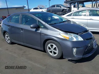 2015 Toyota Prius Four z VIN JTDKN3DU9F1890512, wystawiony jako IAAI lot #41610350 z przebiegiem 86 396 mil mil oraz . Historia ofert i sprzedaży dostępna na DreamBid. Obrazek 1.