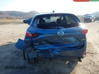 2018 Mazda CX-5 Touring z VIN JM3KFBCM2J0461954, wystawiony jako IAAI lot #41655865 z przebiegiem 129 333 mil mil oraz . Historia ofert i sprzedaży dostępna na DreamBid. Obrazek 15.