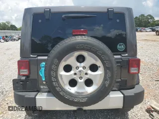 2014 Jeep Wrangler Sahara with VIN 1C4AJWBG8EL248291, listed as a Copart auction lot 60611345 with 84,777 mi miles and Salvage title. Bid and sale history available at DreamBid. Image 6.