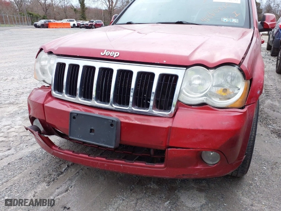 2009 Jeep Grand Cherokee Limited with VIN 1J8HR58P69C553747, listed as a IAAI auction lot 41860865 with 169,841 mi miles. Bid and sale history available at carsss.com. Image 12.