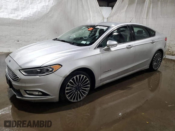2017 Ford Fusion Hybrid Titanium with VIN 3FA6P0RU7HR383920, listed as a Copart auction lot 56320585 with 20,446 mi miles and Non repairable. Bid and sale history available at DreamBid. Image 1.